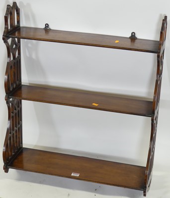 Lot 1234 - An Edwardian stained walnut three-tier...