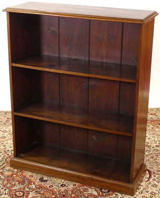 Lot 1255 - A mahogany low freestanding open bookshelf,...