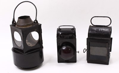Lot 101 - A collection of 3x handlamps, including 1x...