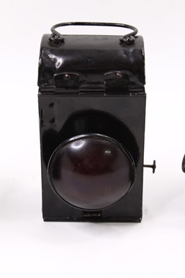 Lot 101 - A collection of 3x handlamps, including 1x...