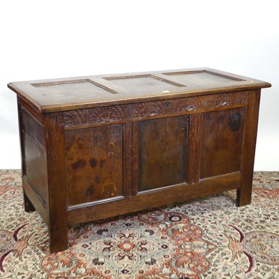 Lot 1336 - A joined oak three-panel hinge topped coffer,...