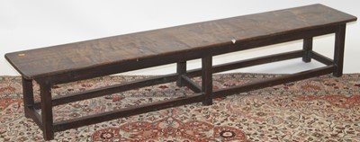 Lot 1341 - A rustic oak long work bench, length 176cm