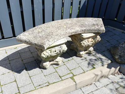 Lot 1349 - A reconstituted stone twin pedestal curved...