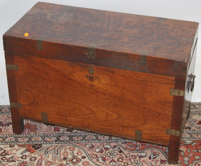 Lot 1263 - A rustic hardwood and brass bound hinge top...