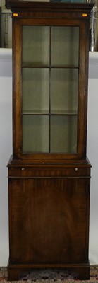 Lot 1269 - A contemporary mahogany narrow side cabinet,...