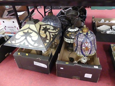 Lot 653 - Four table lamps, each having a Tiffany style...