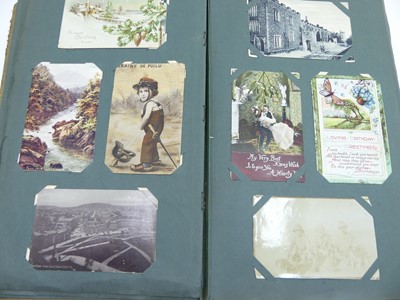 Lot 417 - An album of vintage postcards, to include...