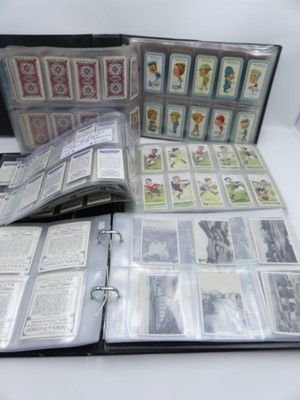 Lot 419 - A collection of vintage cigarette cards, to...