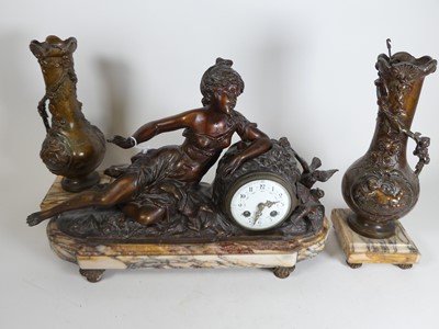 Lot 179 - A 19th century French figural clock garniture,...