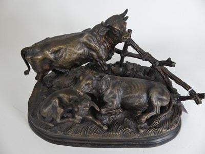 Lot 186 - A bronzed metal cattle group, signed J Moignie,...