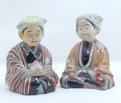 Lot 248 - A pair of Japanese pottery pagoda figures,...