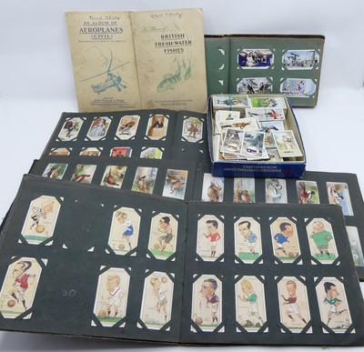 Lot 442 - A collection of vintage cigarette cards and...