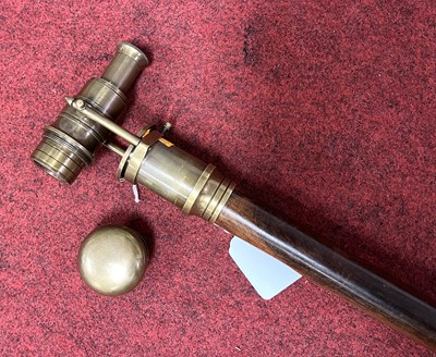 Lot 192 - A reproduction walking stick, having a...