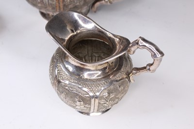 Lot 2066 - A Chinese export silver three-piece tea set,...