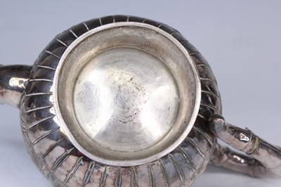 Lot 2066 - A Chinese export silver three-piece tea set,...