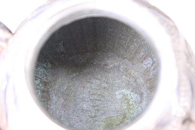 Lot 2066 - A Chinese export silver three-piece tea set,...