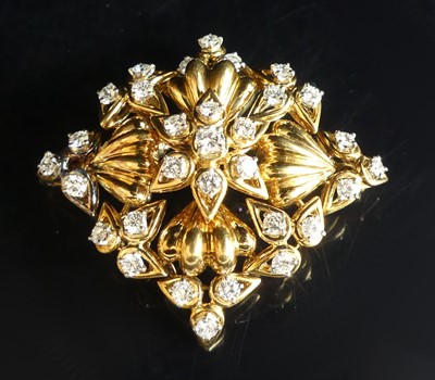 Lot 2293 - A yellow metal diamond square openwork brooch,...