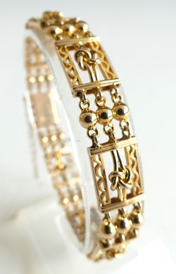 Lot 2309 - A 15ct gold fancy three-bargate link bracelet,...