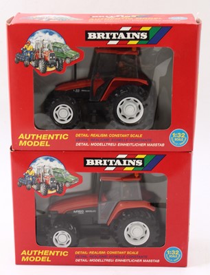 Lot 909 - Britains 1/32nd scale boxed tractor group, to...