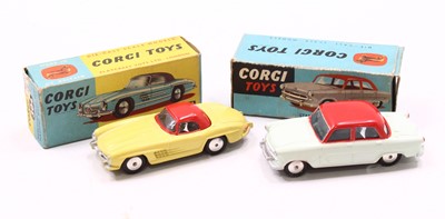 Lot 1489 - A Corgi Toys boxed saloon group to include a...