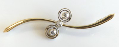 Lot 2300 - A 14ct yellow gold diamond bar brooch,...