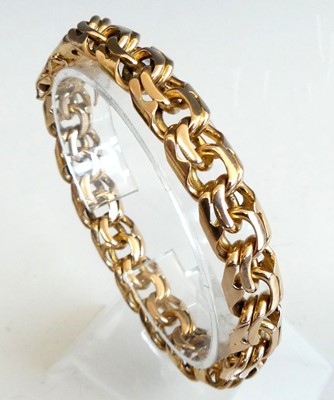 Lot 2313 - An 18ct gold heavy double curblink bracelet,...