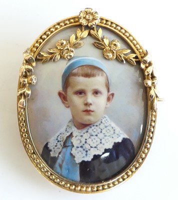 Lot 2335 - An Edwardian yellow metal miniature portrait...