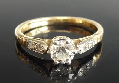 Lot 2511 - A yellow and white metal diamond solitaire...