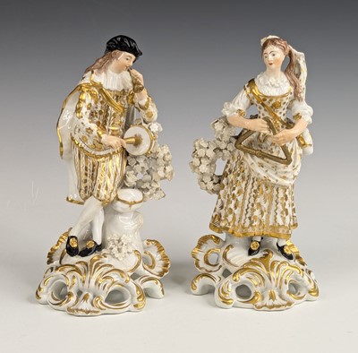 Lot 2063 - A pair of Derby porcelain figures of musicians,...