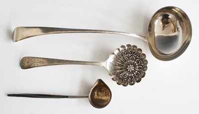 Lot 1071 - A George III silver soup ladle, in the Old...