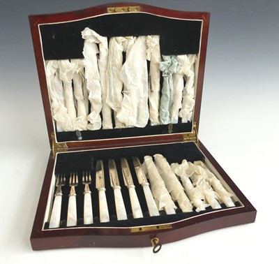 Lot 2225 - A cased 12-place setting of George V silver...