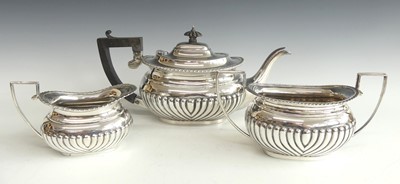 Lot 2236 - A late Victorian silver three-piece tea set,...