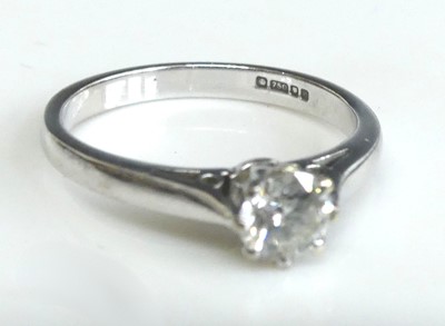 Lot 2565 - An 18ct white gold diamond solitaire ring,...