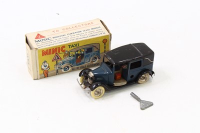 Lot 1912 - A Triang Minic pre-war tinplate and clockwork...