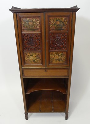 Lot 2555 - An Edwardian mahogany and inlaid music cabinet,...