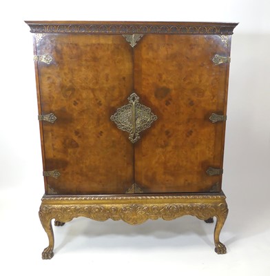 Lot 2616 - A walnut and brass mounted fitted cocktail...