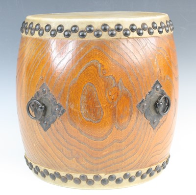 Lot 652 - A Chinese elm Tanggu drum, of barrel shape...