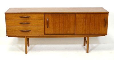 Lot 397 - A 1960s teak low sideboard by Avalon, having...