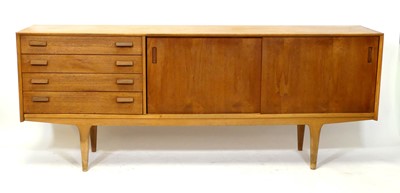 Lot 375 - Ernest Gomme for G-Plan - a 1960s teak long...