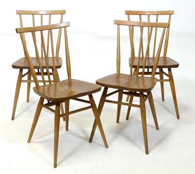 Lot 414 - A set of four 1960s Ercol Model 391 blond elm...