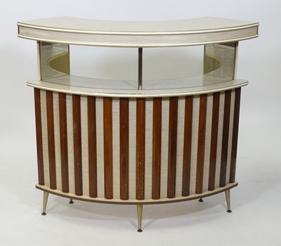 Lot 404 - A 1970s teak and formica freestanding bar, of...