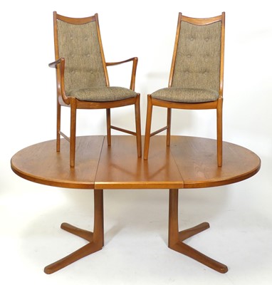 Lot 394 - A 1960s teak dining suite by A.H. McIntosh Ltd,...