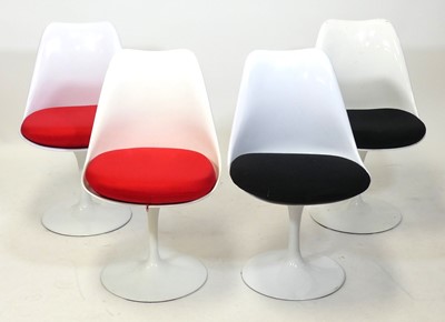 Lot 437 - After Eero Saarinen, a set of four white...