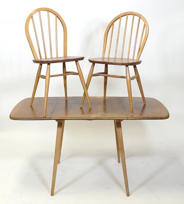 Lot 406 - A 1960s Ercol blond elm and beech breakfast...