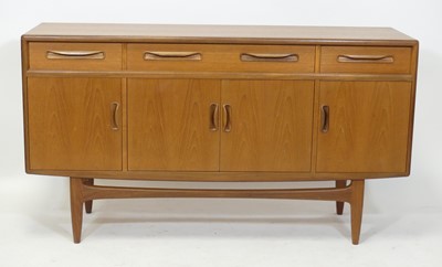 Lot 373 - A 1960s G-Plan teak compact 'Fresco' sideboard,...