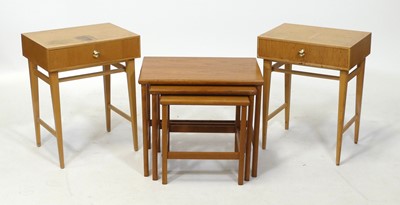 Lot 386 - A 1970s teak nest of three occasional tables,...