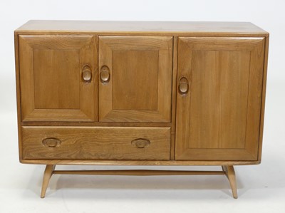 Lot 409 - A 1960s Ercol blond elm 'Windsor' model 366...