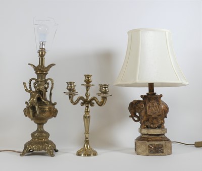 Lot 10 - A gilt resin table lamp in the form of an...