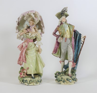 Lot 16 - A pair of continental pottery figures, 20th...