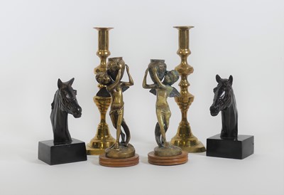 Lot 41 - A pair of figural brass table candlesticks,...